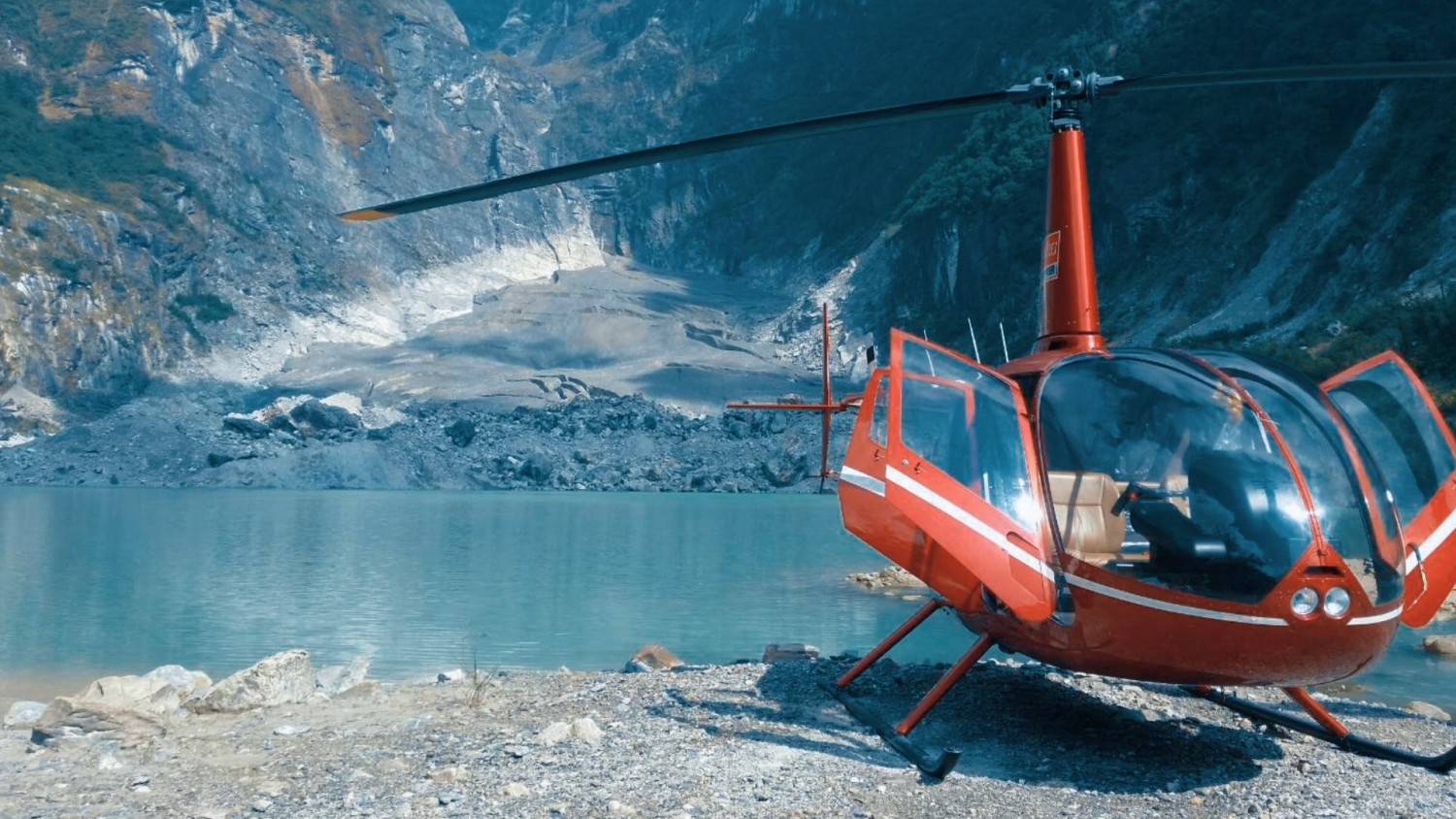 A helicopter landed in Kapuche Lake - Kapuche Lake Helicopter Tour A helicopter landed in Kapuche Lake - Kapuche Lake Helicopter Tour