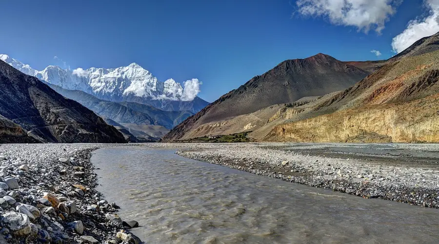 River of Nepal with a beautiful view of mountain in the back